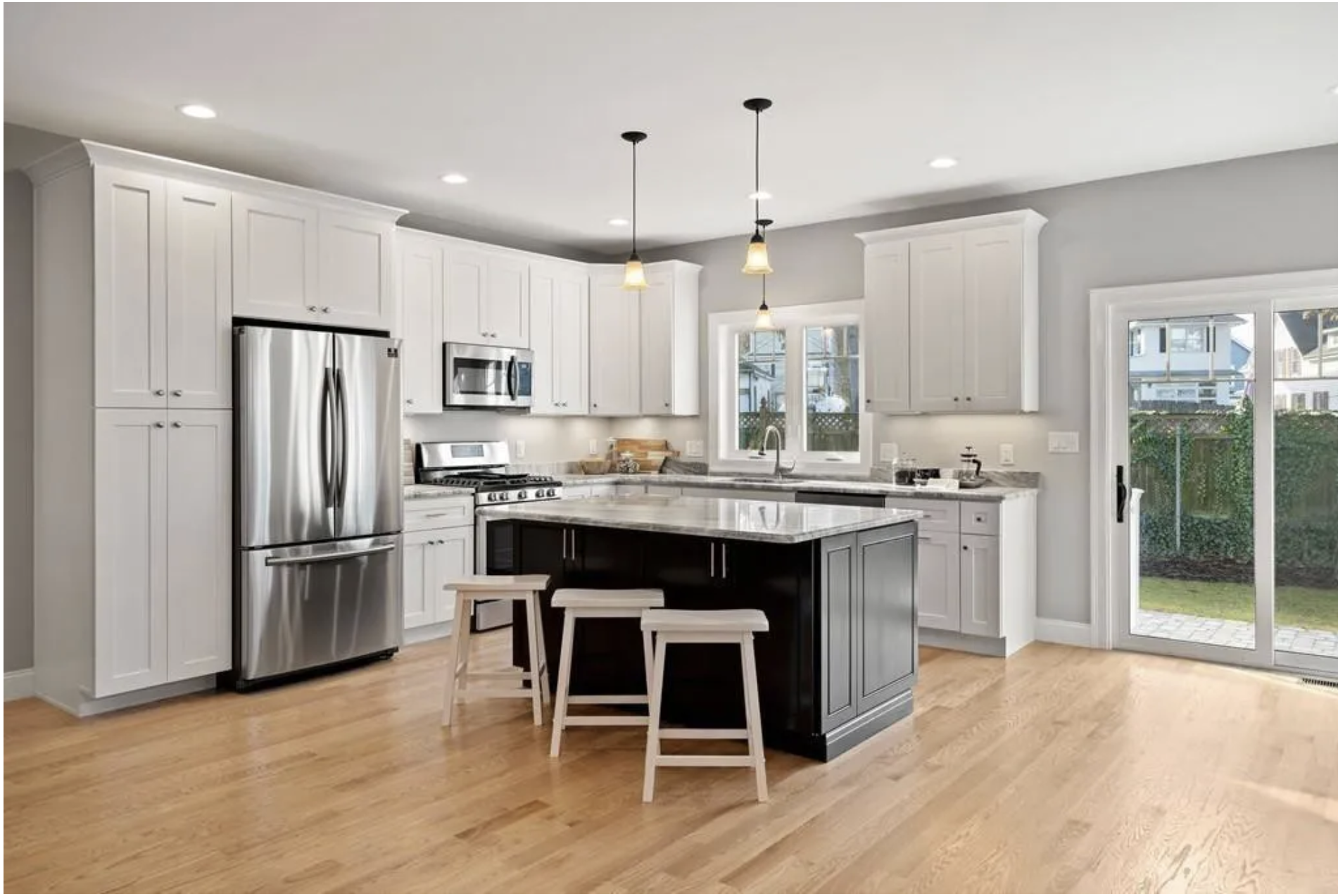 Bright, modern New England kitchen renovation by Ferragamo Custom Builders in Wakefield MA
