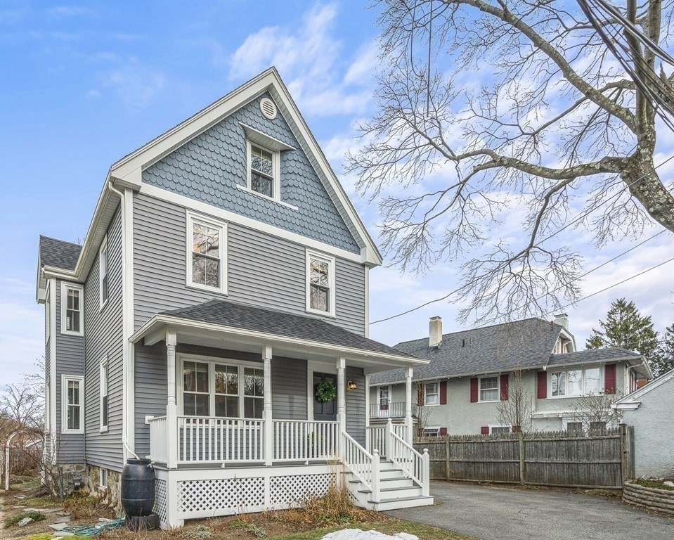 Renovated home exterior with new siding at 16 Orient Place, Melrose MA